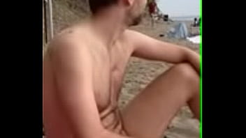 Flagra sexo gay praia de nudismo